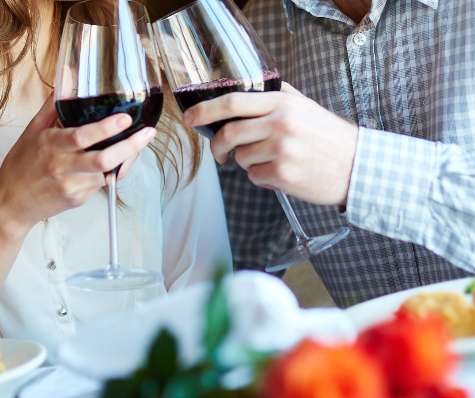 Empty Nesters enjoying dinner and wine